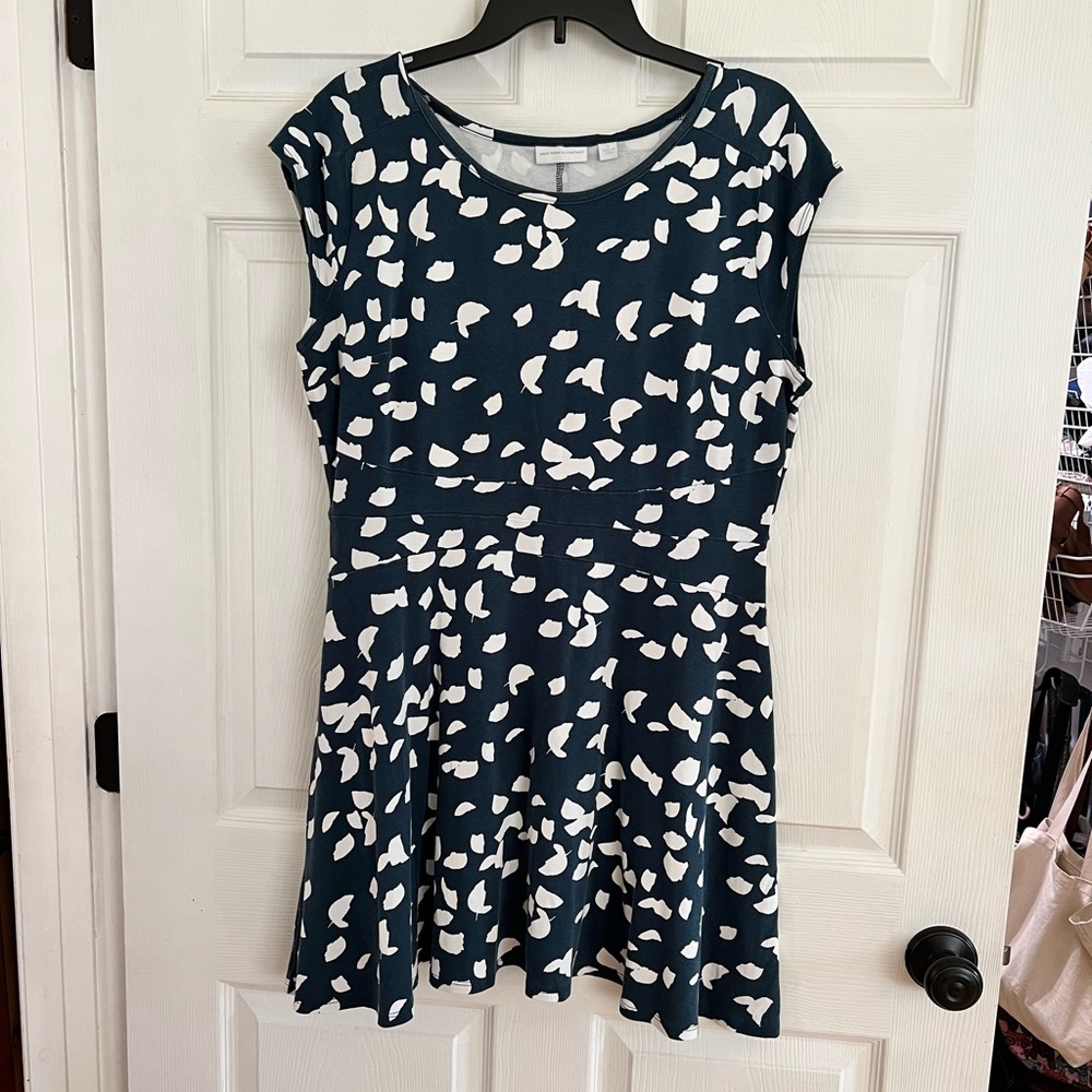 Cute summer dress. 100% cotton very light & stretchy. Some fading.